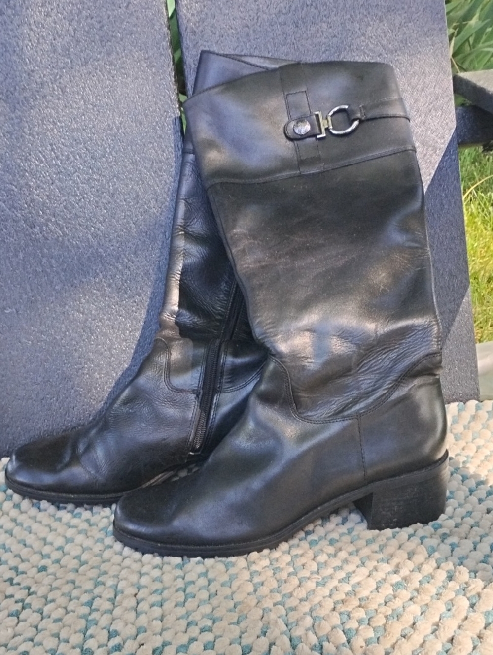 Classic Black Leather Mid-Calf Riding Boots with Silver Buckle Accent